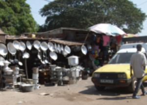 Image of recycled aluminium goods on sale in a Gambian market